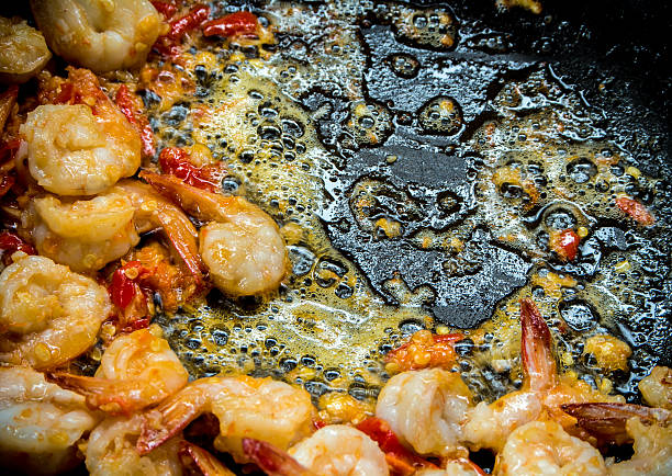 istock Shrimp, Garlic and Chilli fried in a pan 608568104