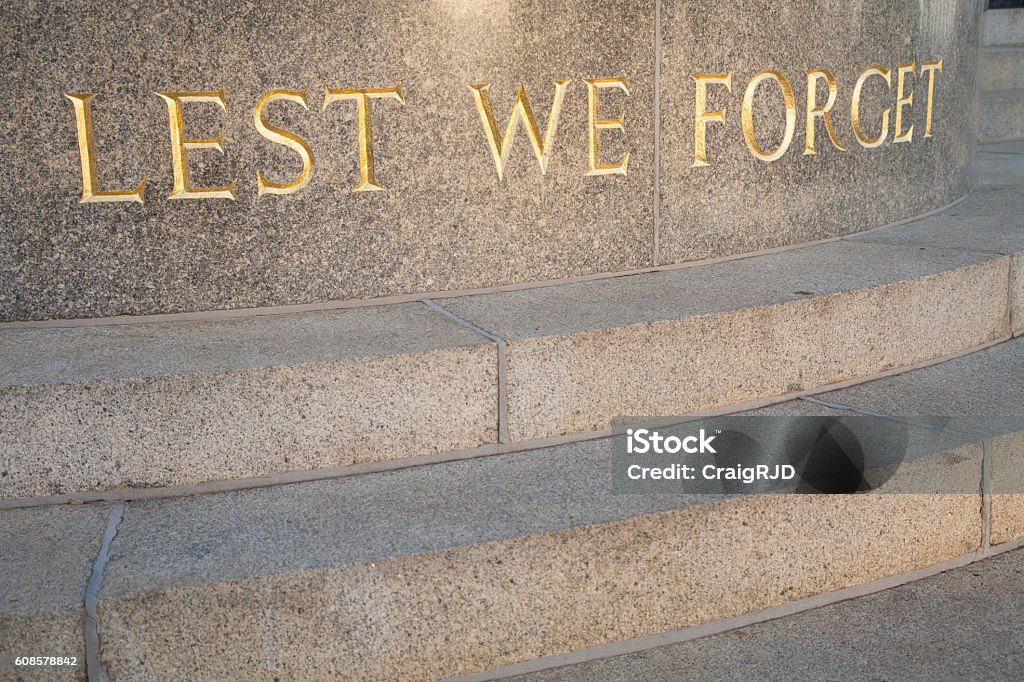 Lest We Forget Lest We Forget. War Memorial. Words to remember the fallen soldiers from the World Wars. Australia Stock Photo