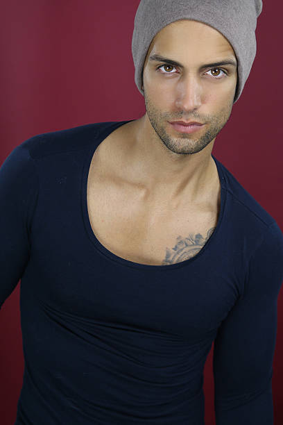 istock Handsome male wearing a brown hat 608586004