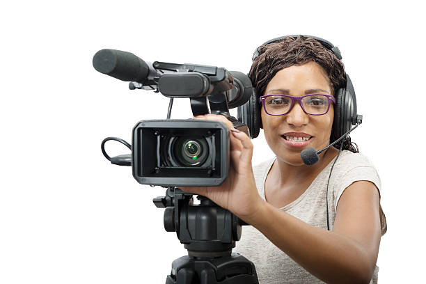 istock young African American women with professional video camera 608590726