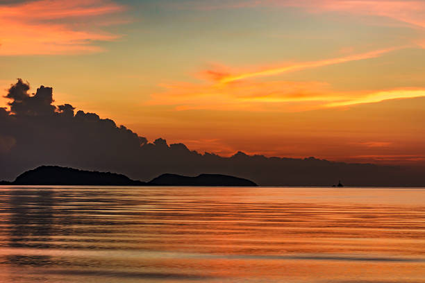 istock Beautiful sunset above the sea 608591114