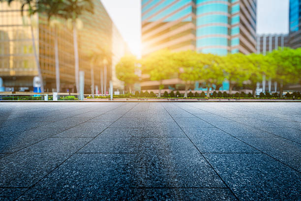 istock empty pavement front of central district of hong kong 608596752