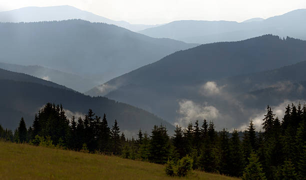 istock Dawn At The Mountain's Valley 608597332
