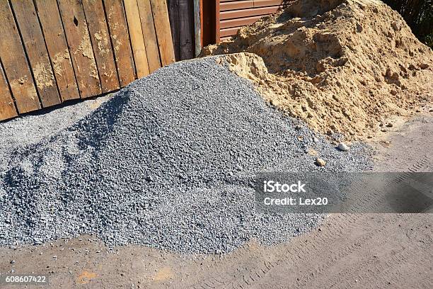 Two Piles Of Gravel And Sand At Industrial Site Stock Photo - Download Image Now - Sand, Asphalt, Ballast