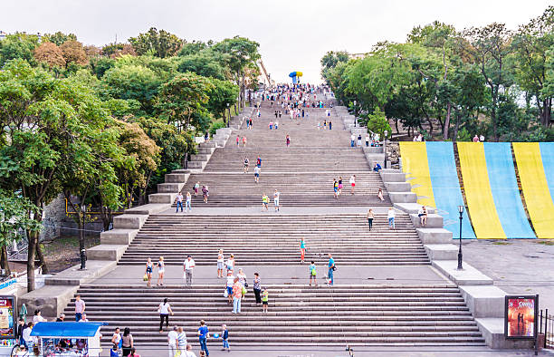 Potemkin Stairs - a tourist attraction of Odessa Odessa city, Ukraine – September 22, 2016: Panorama Of The Potemkin Stairs. One of the most famous tourist attractions of Odessa. Walking down to the port of Odessa and the sea coast. odessa ukraine photos stock pictures, royalty-free photos & images