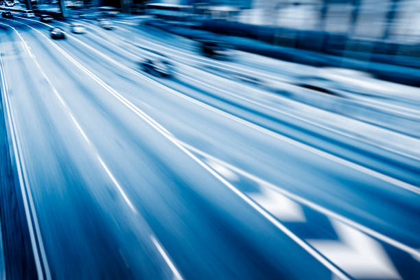 istock cars driving on highway 608621520