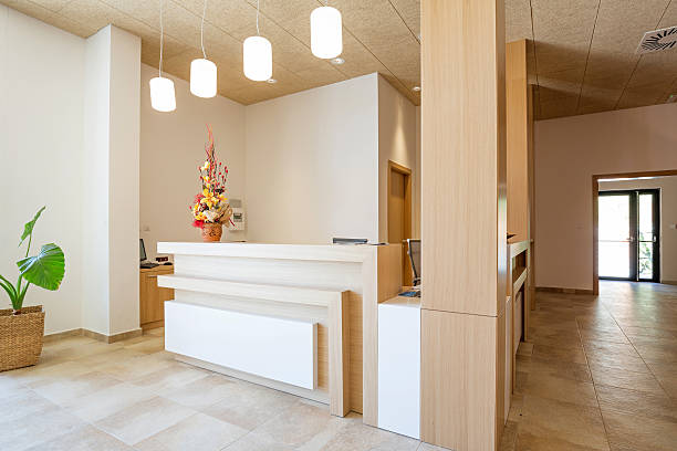 Reception area with wooden reception table stock photo