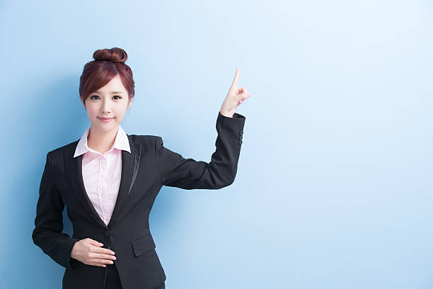 istock business woman show something 608621798