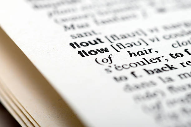 istock Macro of dictionary at word Flow 608623274