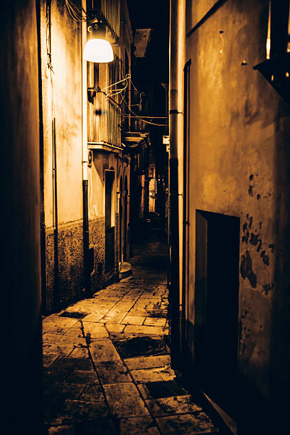 istock Dark alleys. Ragusa, Sicily. 608639054
