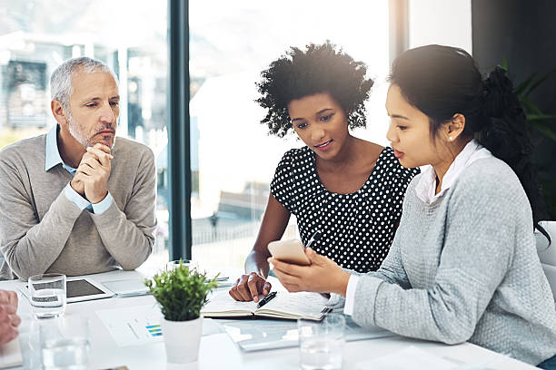 istock Bringing her colleagues up to speed 608639662
