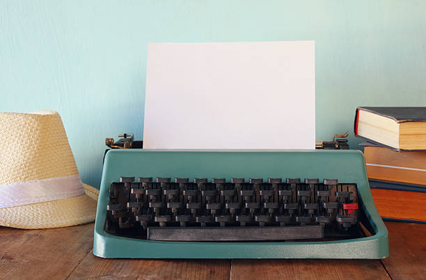 istock Photo of vintage typewriter with blank page 608640428