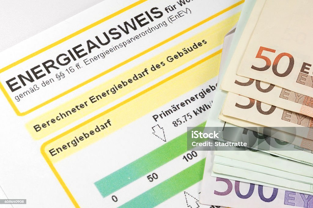 An energy certificate and money An energy certificate and Euro banknotes Certificate Stock Photo