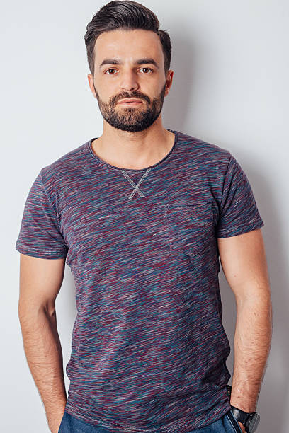 istock Young man standing on the white background. 608641120