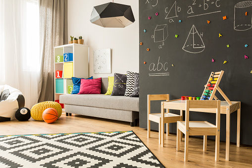 Shot of a creative room for children with a place for play and learn