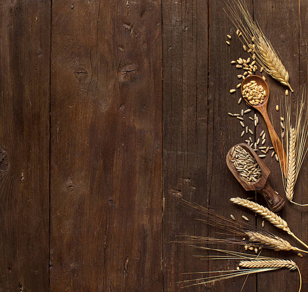 istock Wheat and spelt on wooden background 609033774