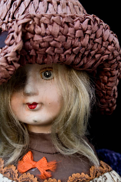 istock Close Up and Isolated Vintage Antique Old Doll 609034568