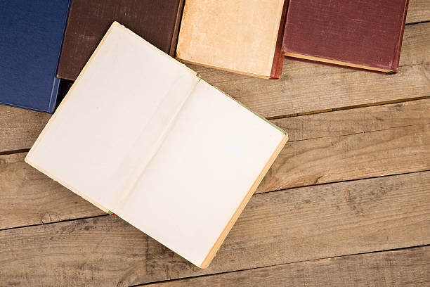 istock Old and used hardback books or text books 609035074