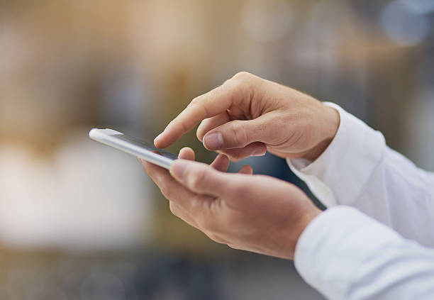 istock Doing business via his cellphone 609035136