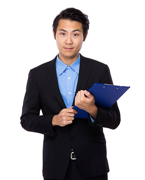 istock Businessman holding clipboard 609035446