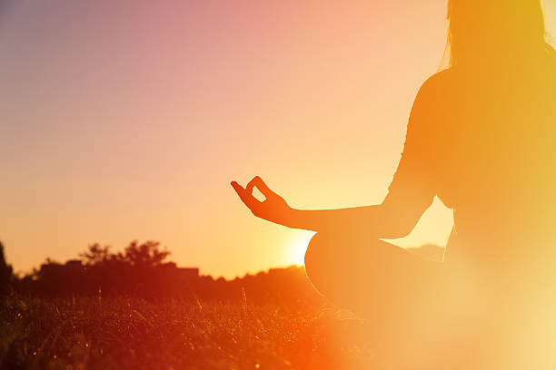 istock serenity and yoga practice at sunset 609036234