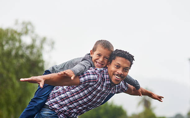 istock Dad and I are superheroes that can fly! 609037214