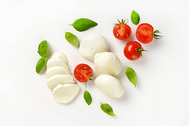 mozzarella, tomatoes and fresh basil mozzarella, tomatoes and fresh basil - ingredients for caprese salad mozzarella photos stock pictures, royalty-free photos & images