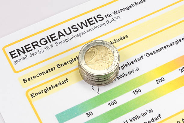Energy certificate and money An energy performance certificate and euro coins energieausweis stock pictures, royalty-free photos & images