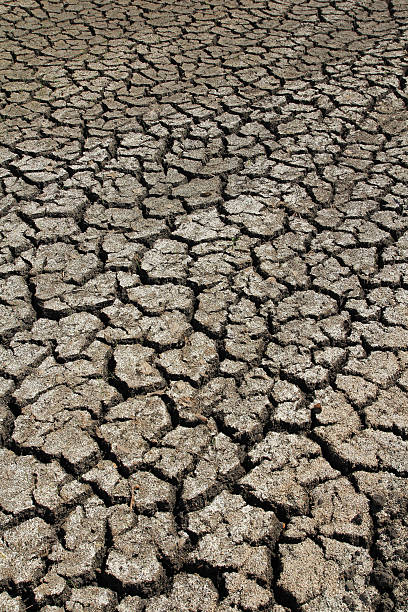 istock Dry Ground Texture, Drought, the ground cracks, no hot water 609040818