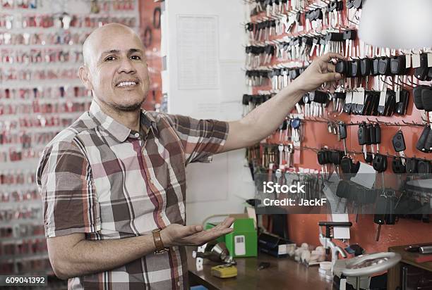 Worker With Car Keys In Locksmith Stock Photo - Download Image Now - Car, Horizontal, Key