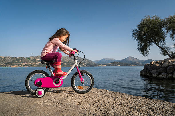Young girl riding bicycle