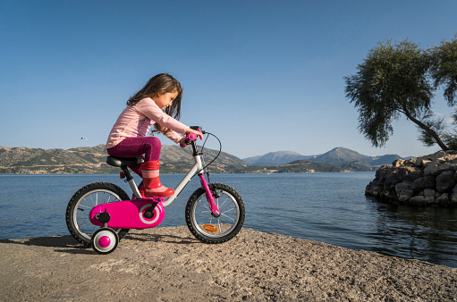 Young girl riding bicycle