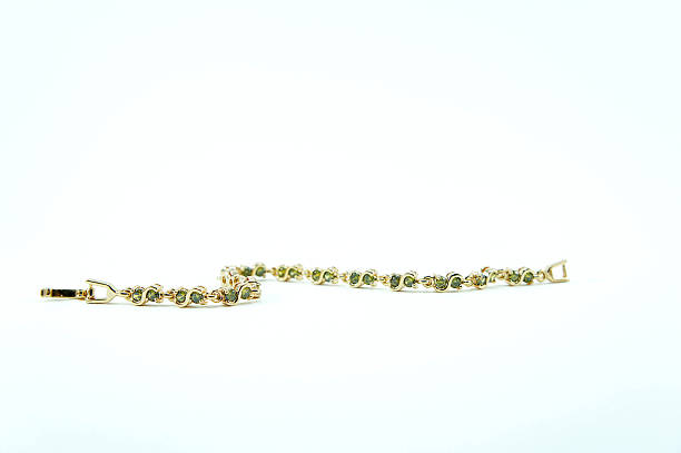istock The Bracelet green sapphire on white background 609046178