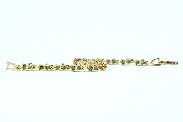 istock The Bracelet green sapphire on white background 609046264