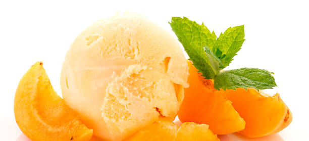 istock Vanilla ice cream and fresh apricots. 609049352