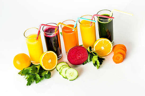 istock Vegetable juice variety on white background 609052886