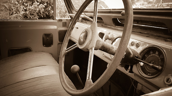 Inside the old car, vintage sepia tone.