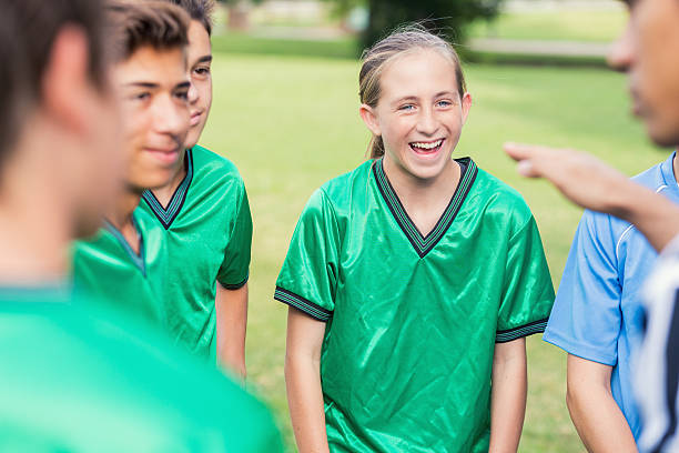 istock Soccer coach gives team a pep talk during time out 609056782