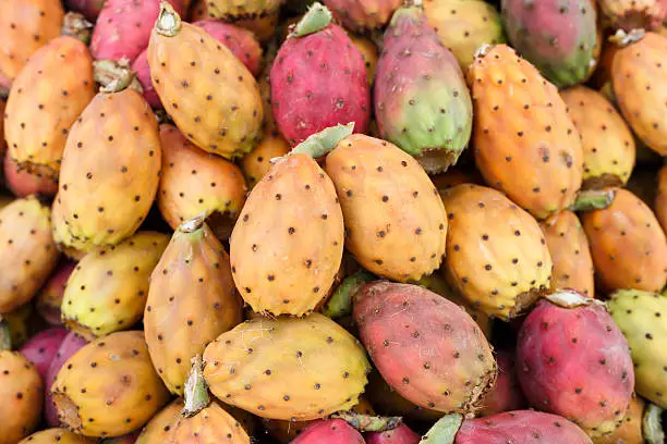 Fresh ripe whole Prickly Pears at the market stall, Sicily