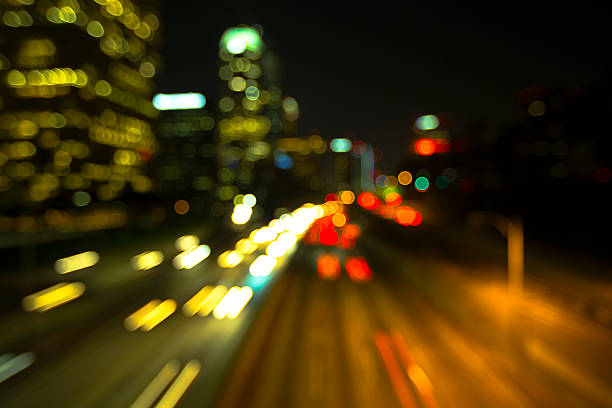istock Defocused highway lights in California 609057630