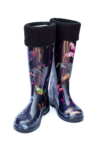 istock Warm black female rubber boots isolated on white background 609057960