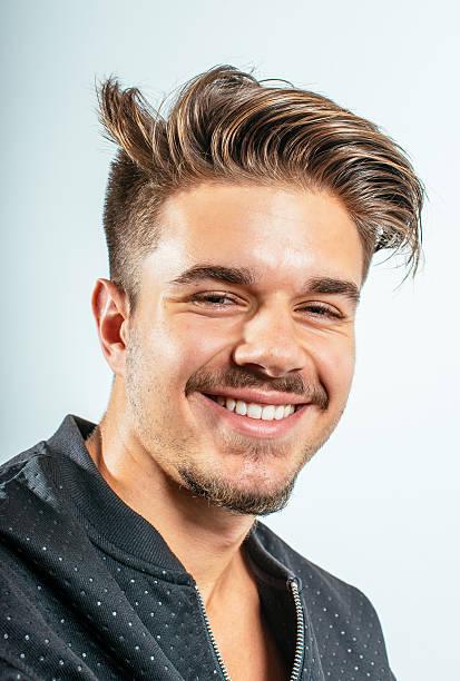 istock Handsome youg male model with modern hairstyle 609061752