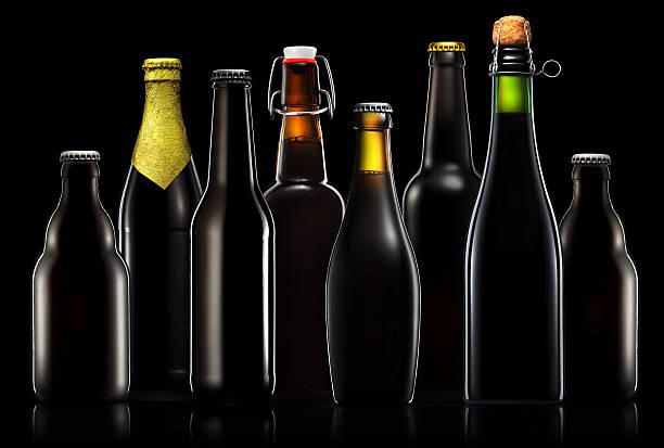 istock Set of beer bottles isolated on black background 609063752
