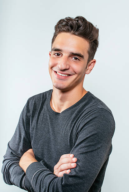 istock Handsome youg male model with modern hairstyle 609072942