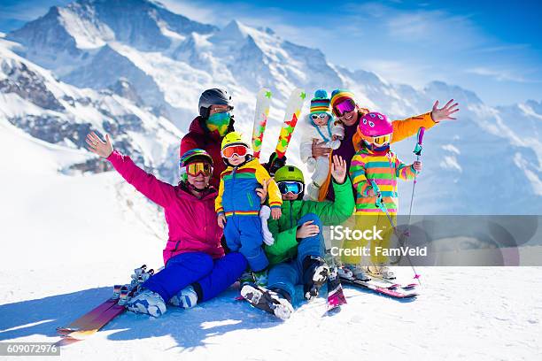 Family With Kids In The Mountains Stock Photo - Download Image Now - Skiing, Family, Ski