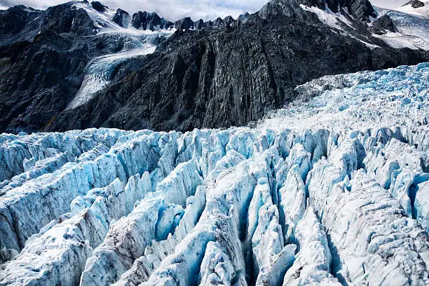 Aerial shot of Franz Josef Glacier in Westland Tai Poutini National Park part of the Southern Alps, New Zealand.