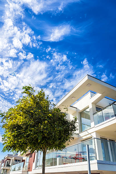 istock Balconies in white modern apartment building, Poland 609081360