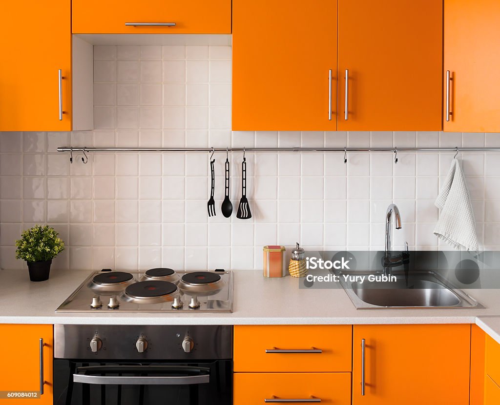 Modern bright orange kitchen room Stock Photo by ©iriana88w 52125527