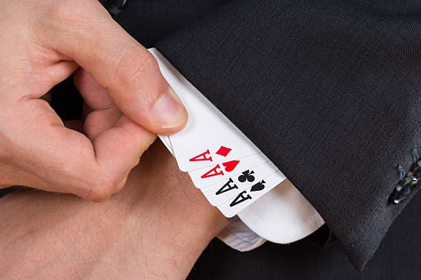 istock Businessman Removing Ace Cards From Sleeve 609084034