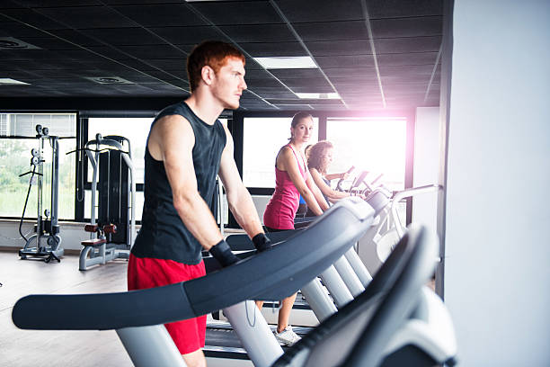 istock people on the gym treadmill 609087150
